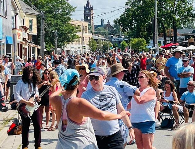 A large group of people gathered on the main strip of Wortley Village in London, Ont., dancing and listening to live music.