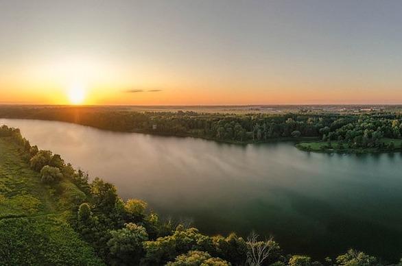The sun setting on Fanshawe Lake in the summer season, located in London, Ontario