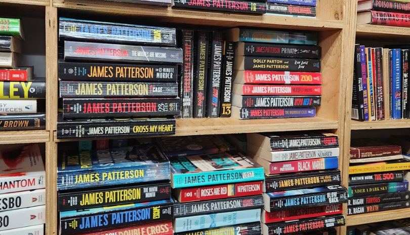 Shelf filled with used books.