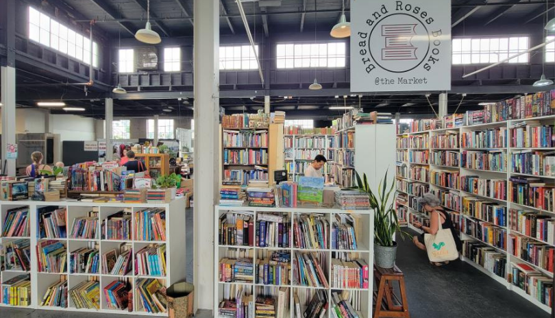 Customers browse bookshelves.