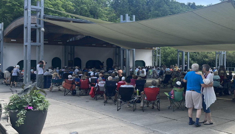 Crowd dances and enjoys live music at Springbank Gardens Concert Series